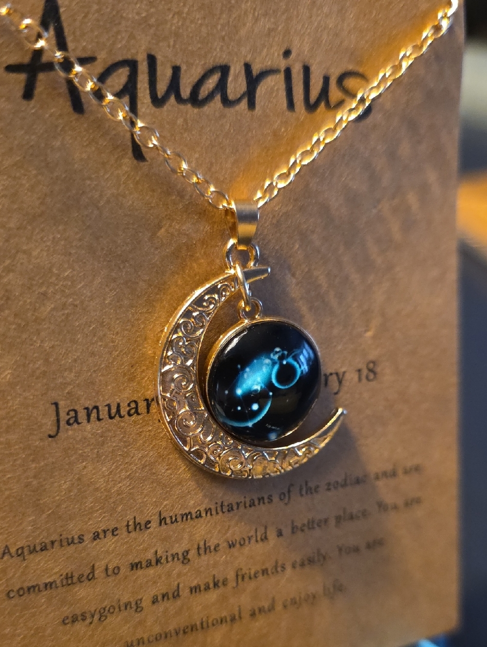 Aquarius Gold-Tone Crescent Moon Necklace with Black Zodiac Pendant - Picture 3 of 9